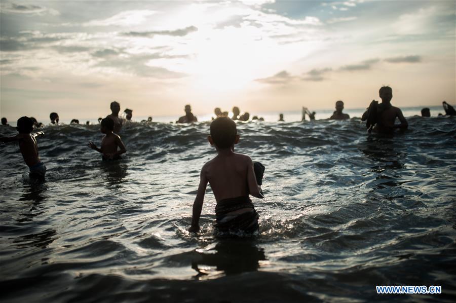 INDONESIA-BALI-MUD BATHS TRADITION