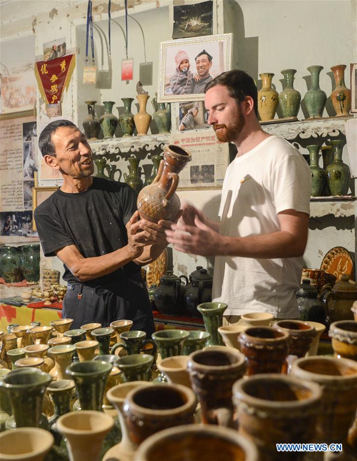 Xinhua Headlines: Xinjiang's hearts, minds open up to Silk Road