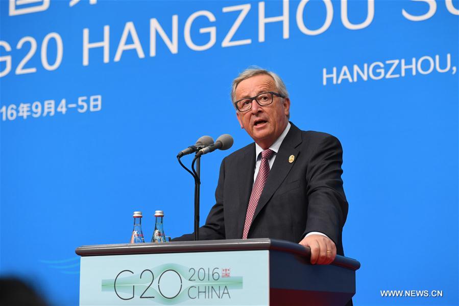 European Commission President Jean-Claude Juncker (R) speaks during the EU Delegation press conference of the G20 Summit in Hangzhou, capital of east China's Zhejiang Province, Sept. 4, 2016. (Xinhua/Li He)  European Commission President Jean-Claude Juncker (R) speaks during the EU Delegation press conference of the G20 Summit in Hangzhou, capital of east China's Zhejiang Province, Sept. 4, 2016. (Xinhua/Li He)