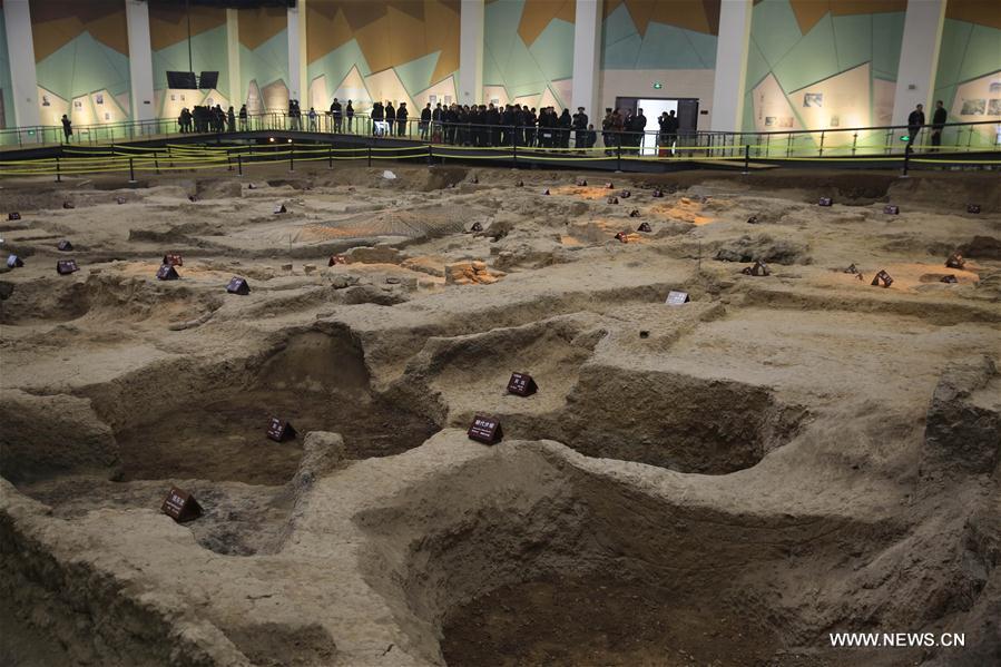 Tourists visit the Ruguanyao kiln site in Qingliangsi Village of Baofeng County, central China's Henan Province, Jan. 16, 2017.  Tourists visit the Ruguanyao kiln site in Qingliangsi Village of Baofeng County, central China's Henan Province, Jan. 16, 2017.