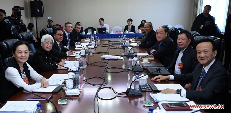 Photo taken on March 9, 2017 shows the scene of a plenary meeting of the 12th National People's Congress (NPC) deputies from Macao Special Administrative Region during the annual NPC session in Beijing, capital of China. The meeting was opened to media. (Xinhua/Wu Xiaoling) Photo taken on March 9, 2017 shows the scene of a plenary meeting of the 12th National People's Congress (NPC) deputies from Macao Special Administrative Region during the annual NPC session in Beijing, capital of China. The meeting was opened to media. (Xinhua/Wu Xiaoling)