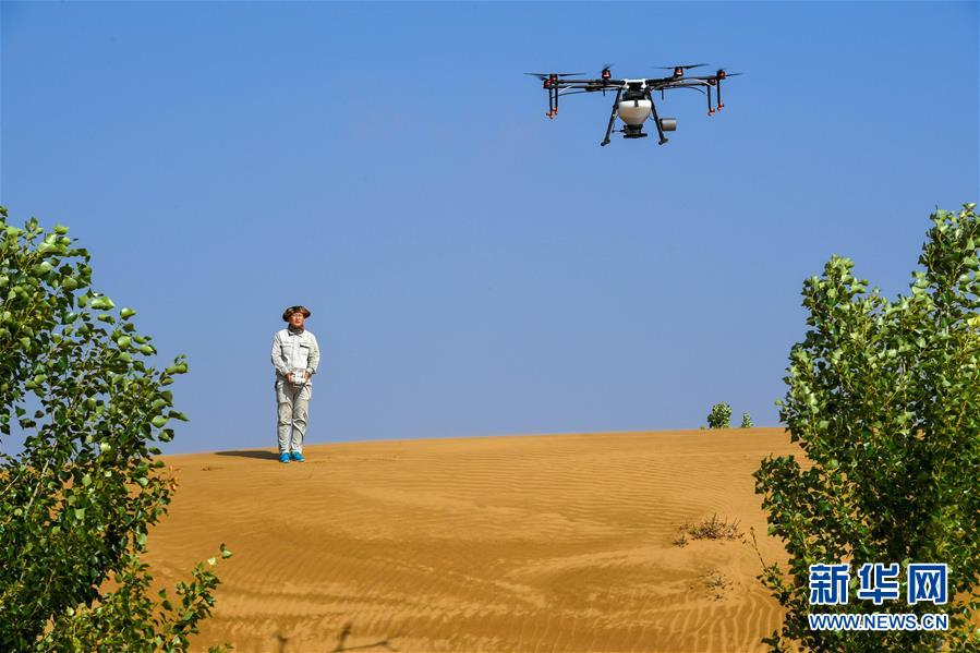 (新華全媒頭條·在習近平新時代中國特色社會主義思想指引下——新時代新作為新篇章·圖文互動)(2)綠富同興畫卷在沙海中鋪展——庫布其沙漠生態治理紀實