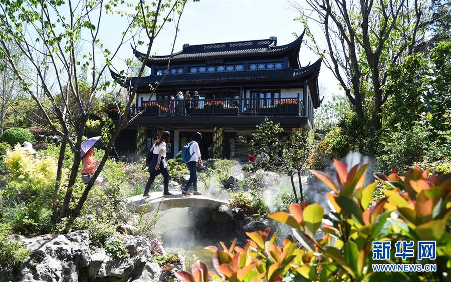 (在習近平新時代中國特色社會主義思想指引下——新時代新作為新篇章·圖文互動)(5)從世園會“看”中國綠色發展之路——寫在北京世園會“中國國家館日”到來之際