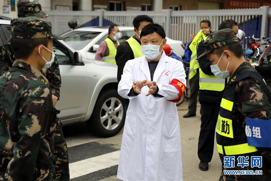 (聚焦疫情防控·圖文互動)待到櫻花盛開時 再回來吃一碗熱干面——一對武漢兄弟的共同戰“疫”