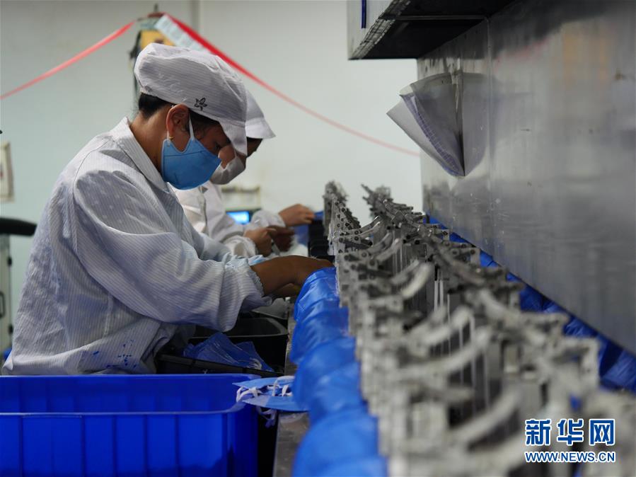 (聚焦疫情防控·圖文互動)(4)一家醫療企業的口罩戰“疫”