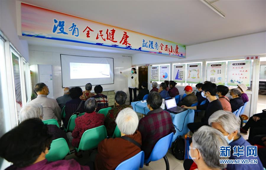 (新華全媒頭條·兩會精神看落實·圖文互動)(3)整體謀劃、系統(tǒng)升級、全面提升——落實全國兩會精神織牢織密公共衛(wèi)生防護網(wǎng)