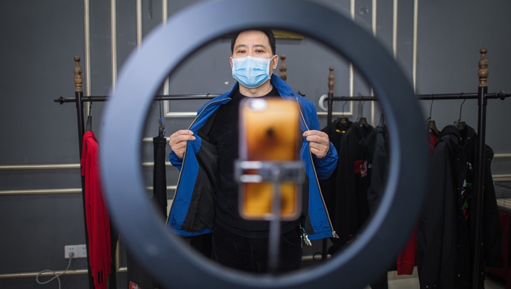 新華社評論員:在抗疫大考中化危為機