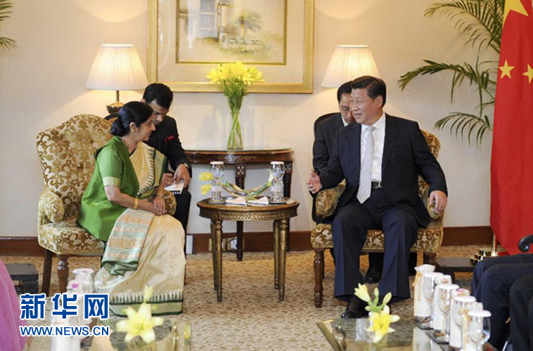 9月18日，國家主席習近平在新德里會見印度外長斯瓦拉杰。新華社記者 張鐸 攝